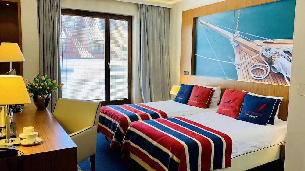โรงแรมกดัญสก์ บูทิก ภายนอก รูปภาพ A room at the hotel