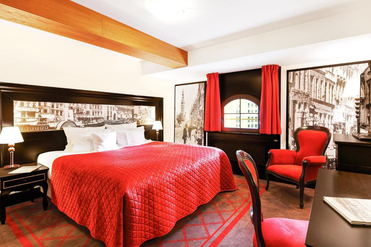 โรงแรมกดัญสก์ บูทิก ภายนอก รูปภาพ A room at the hotel