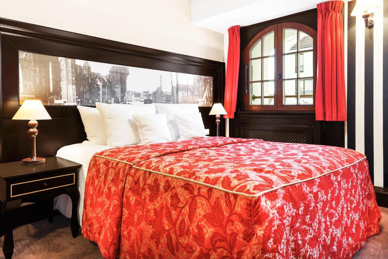 โรงแรมกดัญสก์ บูทิก ภายนอก รูปภาพ A typical room at the hotel