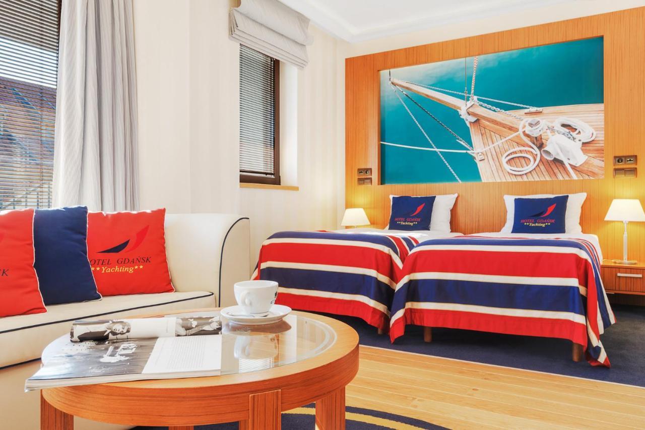 โรงแรมกดัญสก์ บูทิก ภายนอก รูปภาพ A room at the hotel